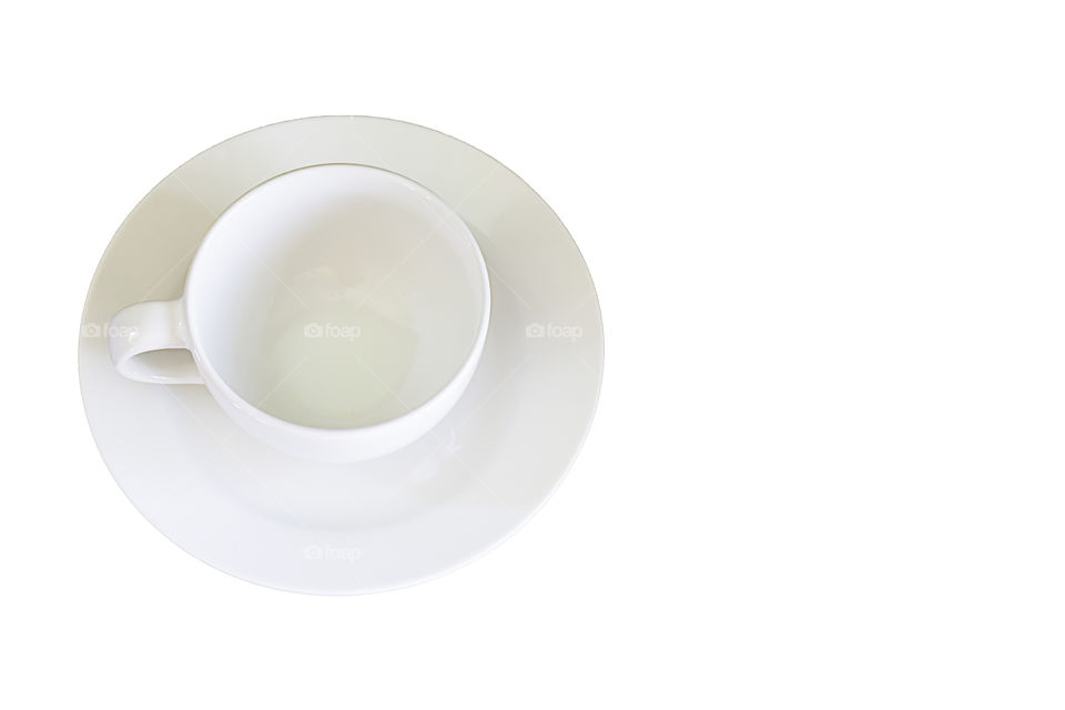 Top view of the glass and white ceramic plate on a white background with clipping path.