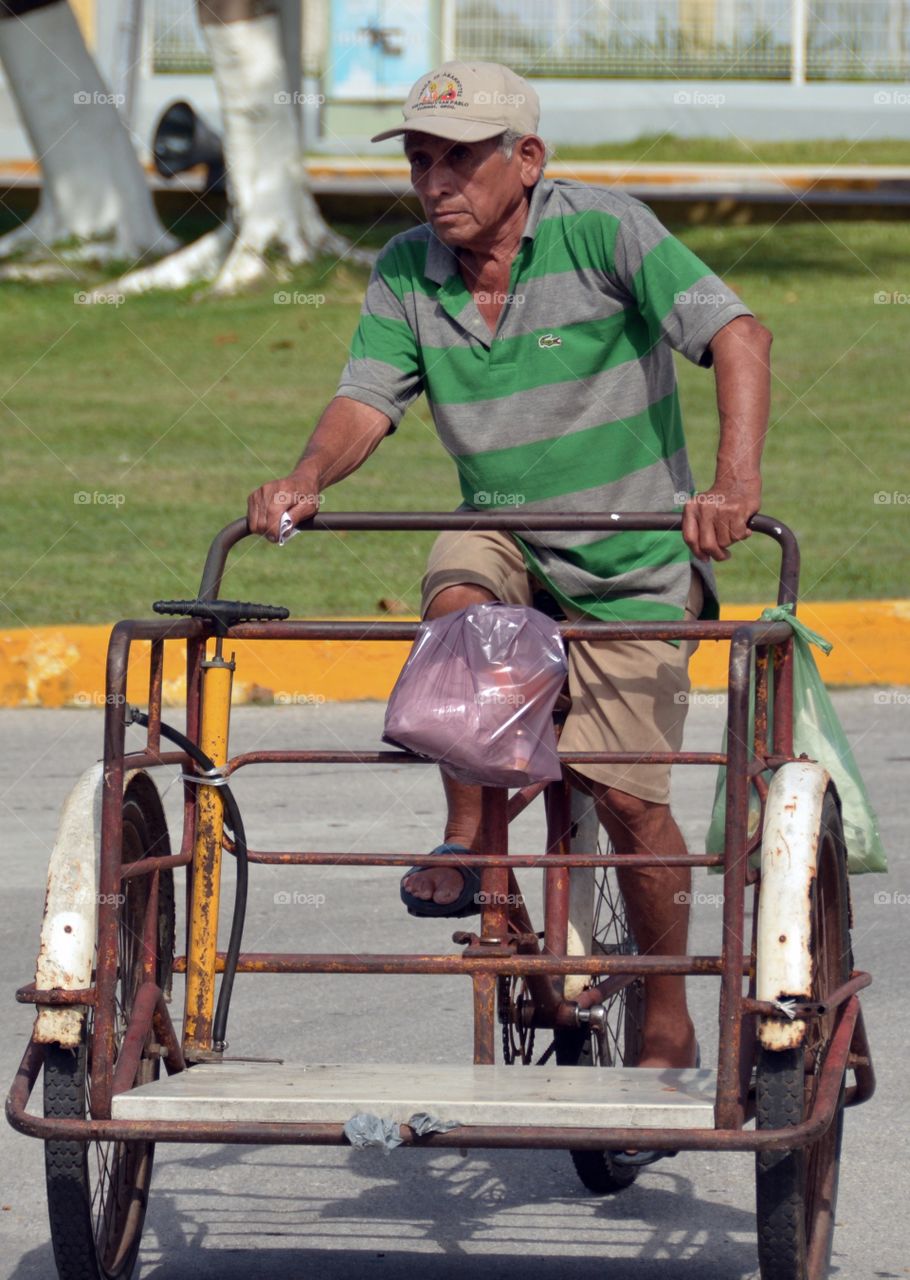Old man, rusty Bike