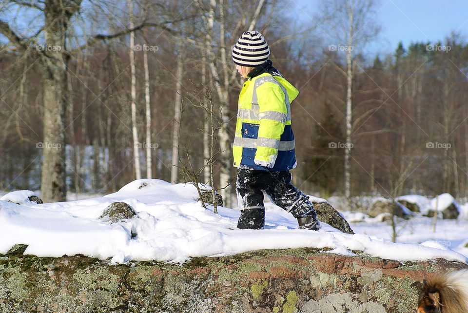 Girl walking in the snow