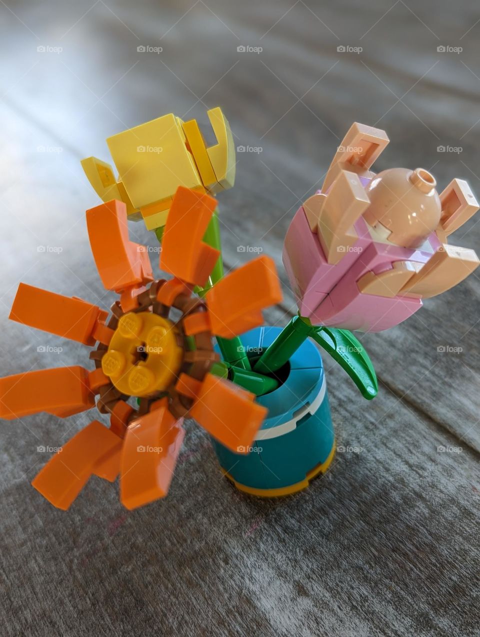 colorfully displayed Lego flowers in a vase