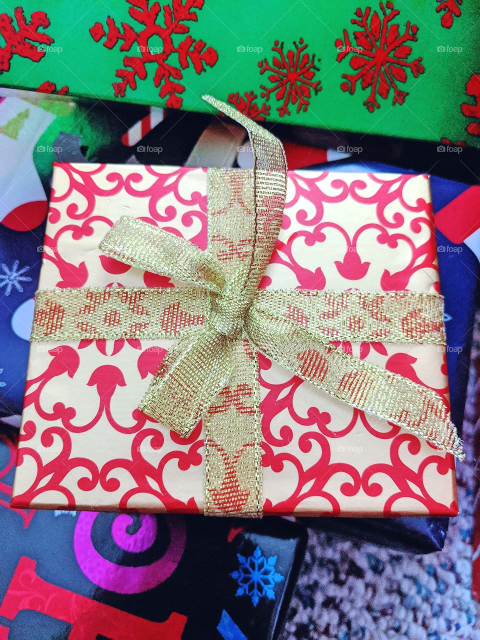 Holiday gift gold and red accents