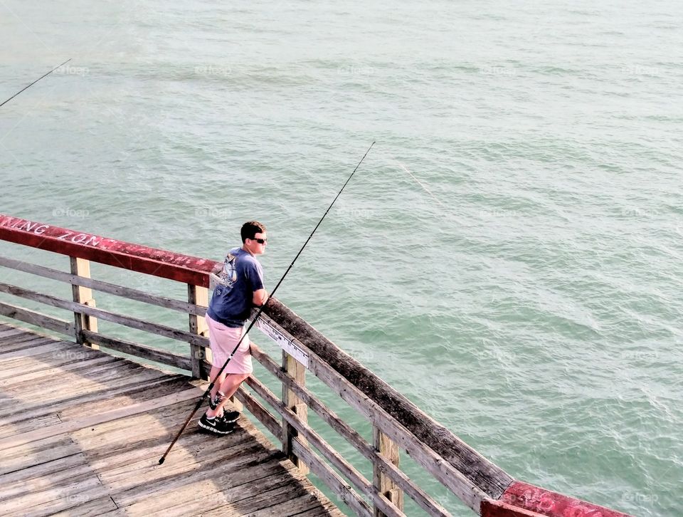 fishing off a pier