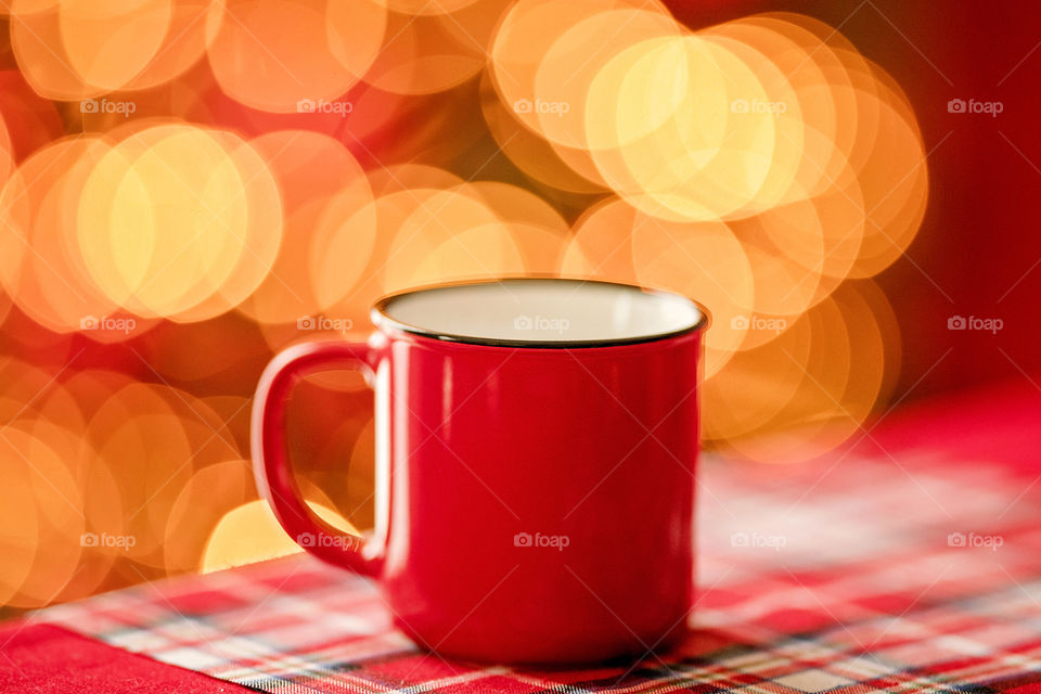 cup of coffee in a cozy festive Christmas atmosphere