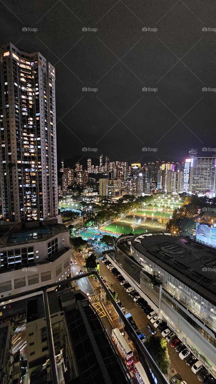 Night view of Hong Kong Victoria Park on a rainy night