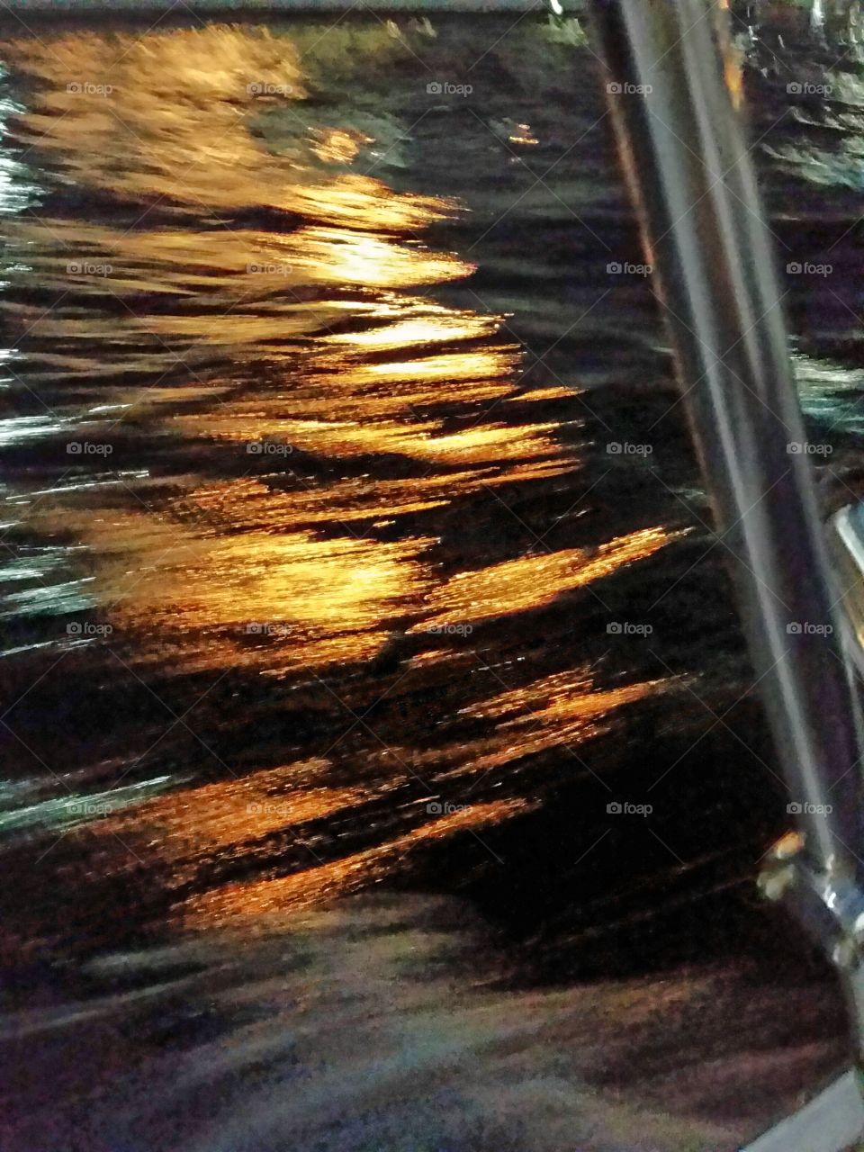 golden splashes. brush strokes on the waters