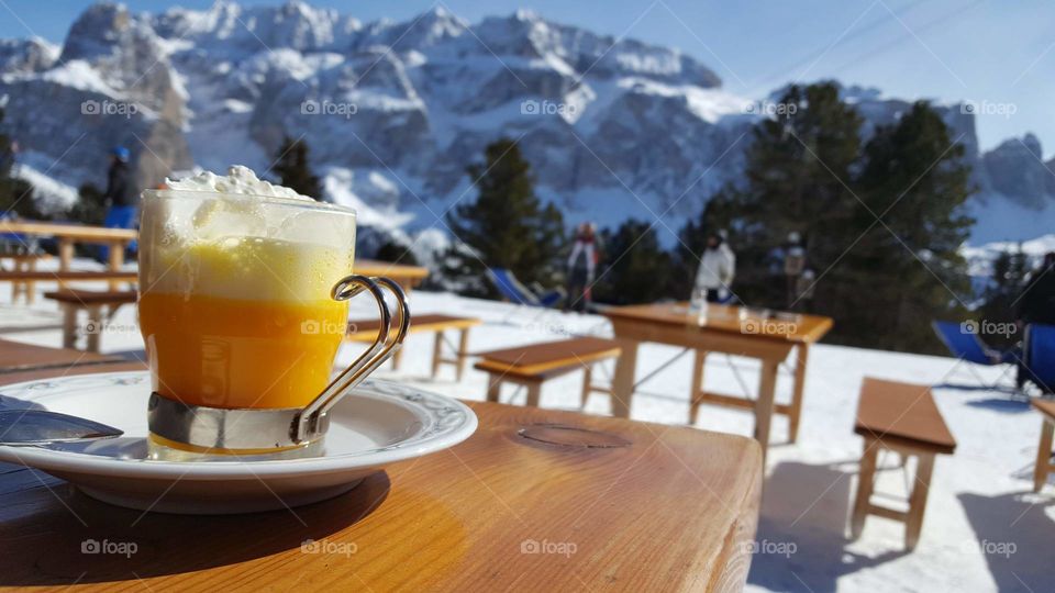 Bombardino during a sunny day of skiing in Italian Alps