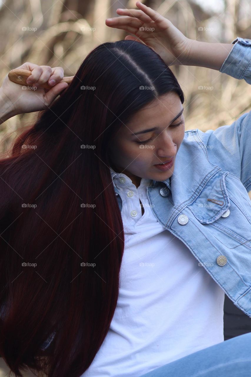 Young woman with a long hair