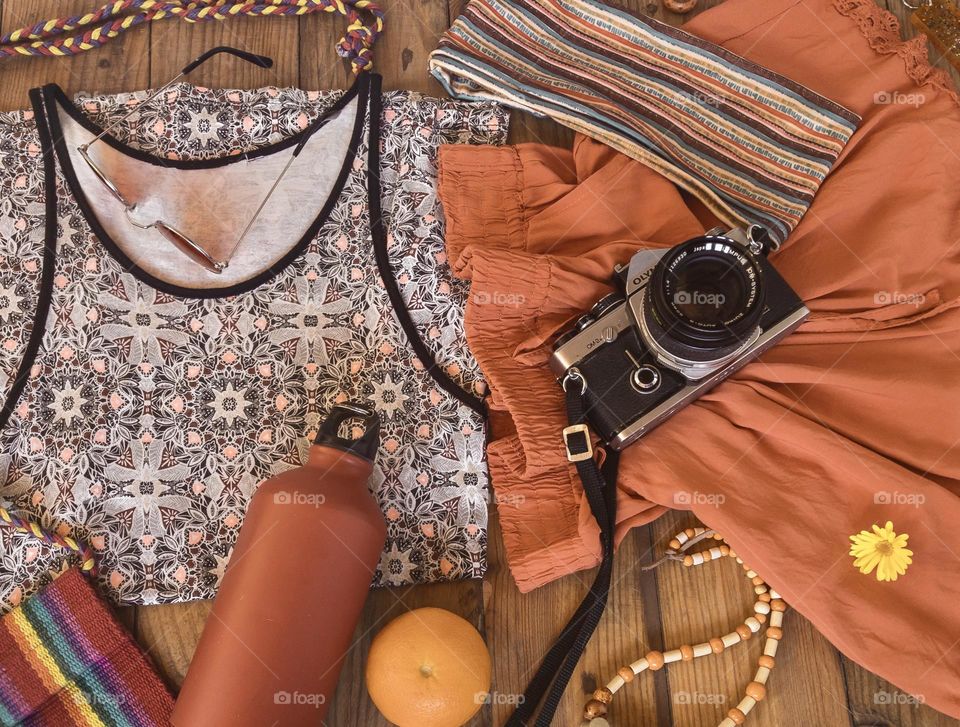 Summer day out flat lay featuring an analogue camera