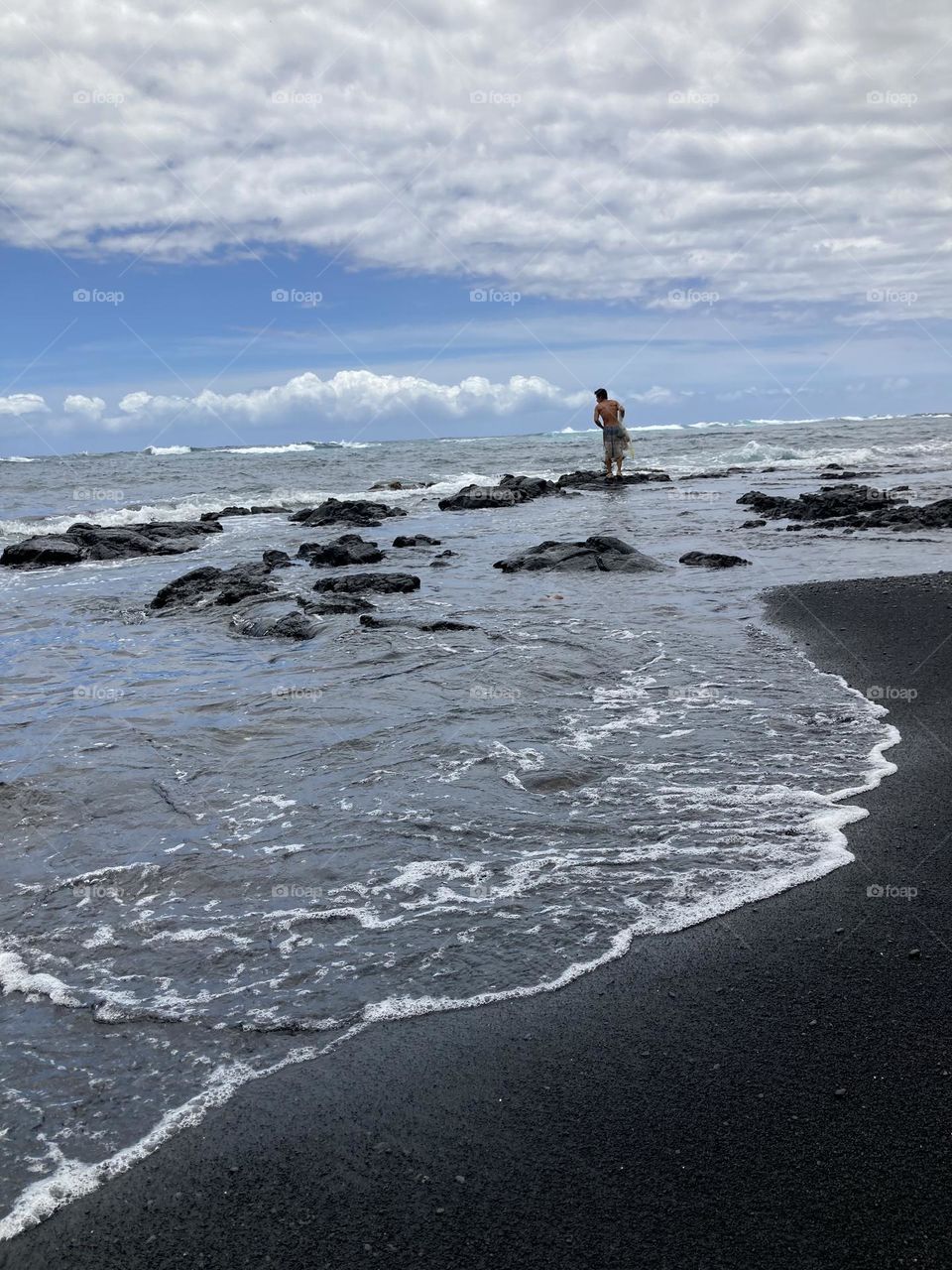 Fishing at Punalu’u Black Sand Beach 