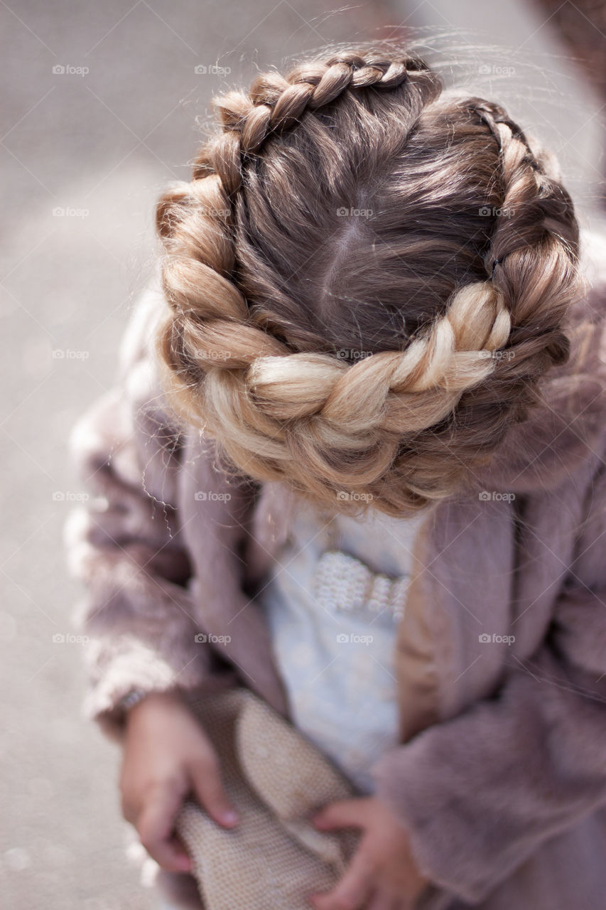 Girl with braided hairstyle