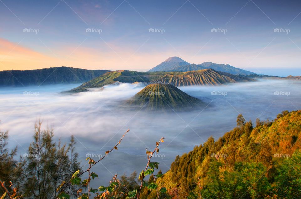 Sunrise at mount bromo. Mount Bromo, is an active volcano and part of the Tengger massif, in East Java, Indonesia.