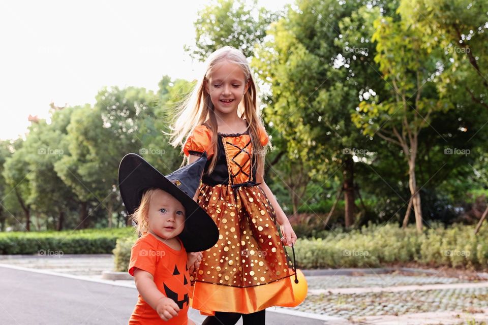 Kids celebrating Halloween outdoor 