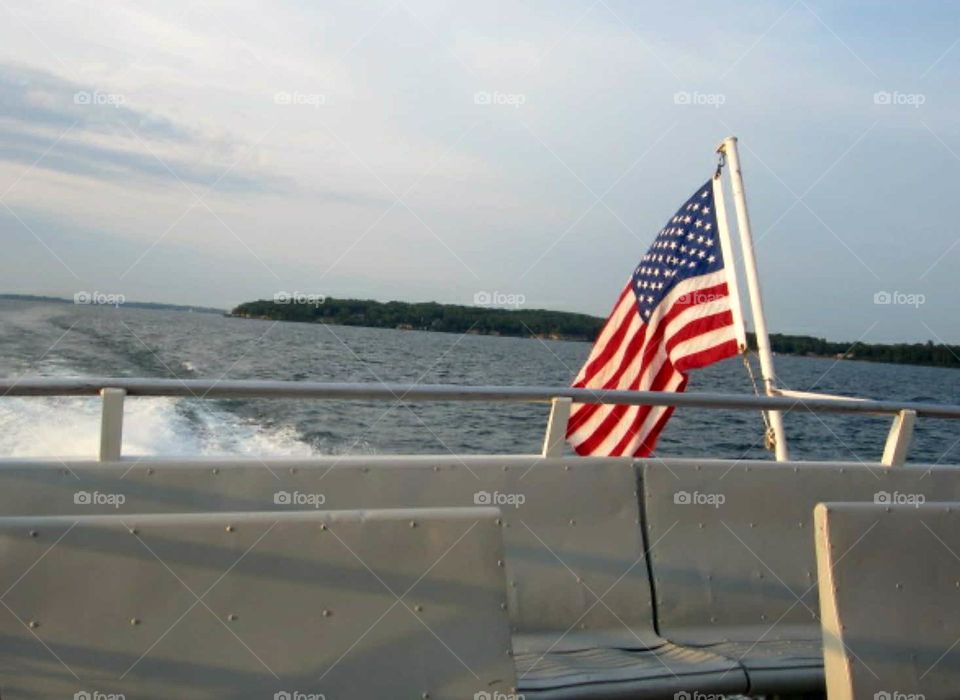 American flag on the back of the boat