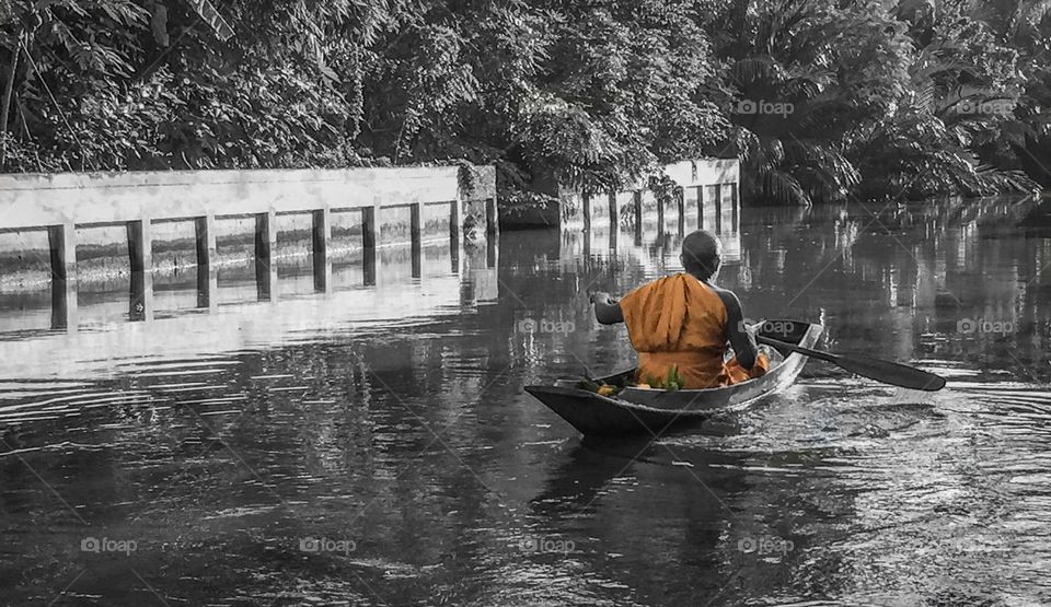 Monk in the small boat 