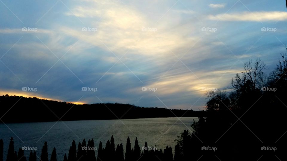 sunset on the lake in winter.