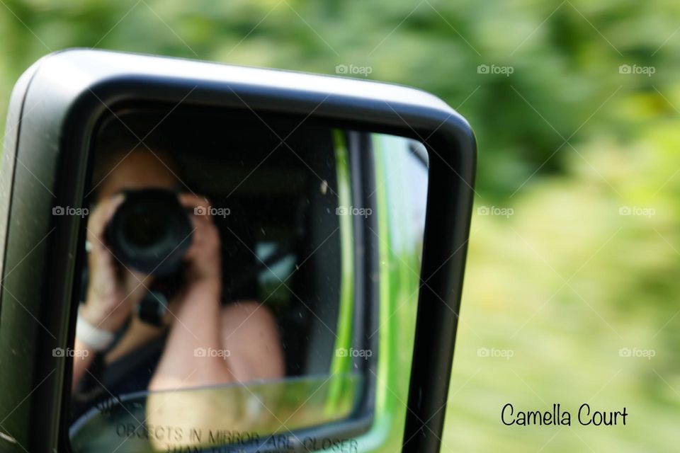 Jeep Wrangler on the go, green reflection
