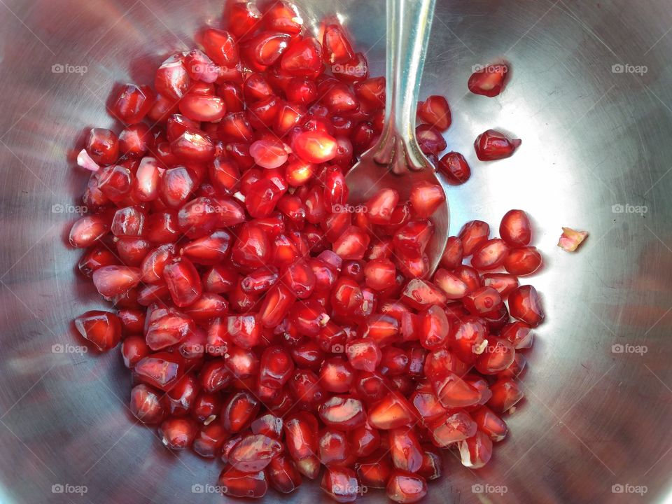 pomegranate in a steel bowl