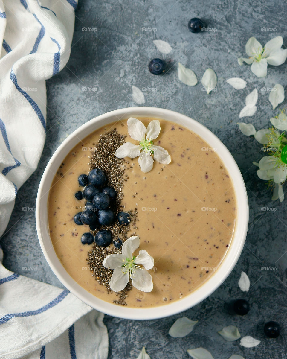 Blue berries smoothie in bowl