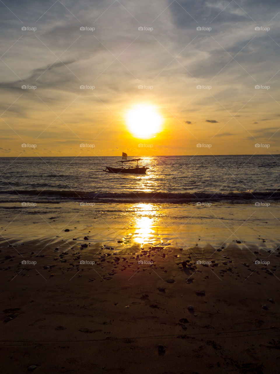 sunset on the shores of Kuta Beach in Bali