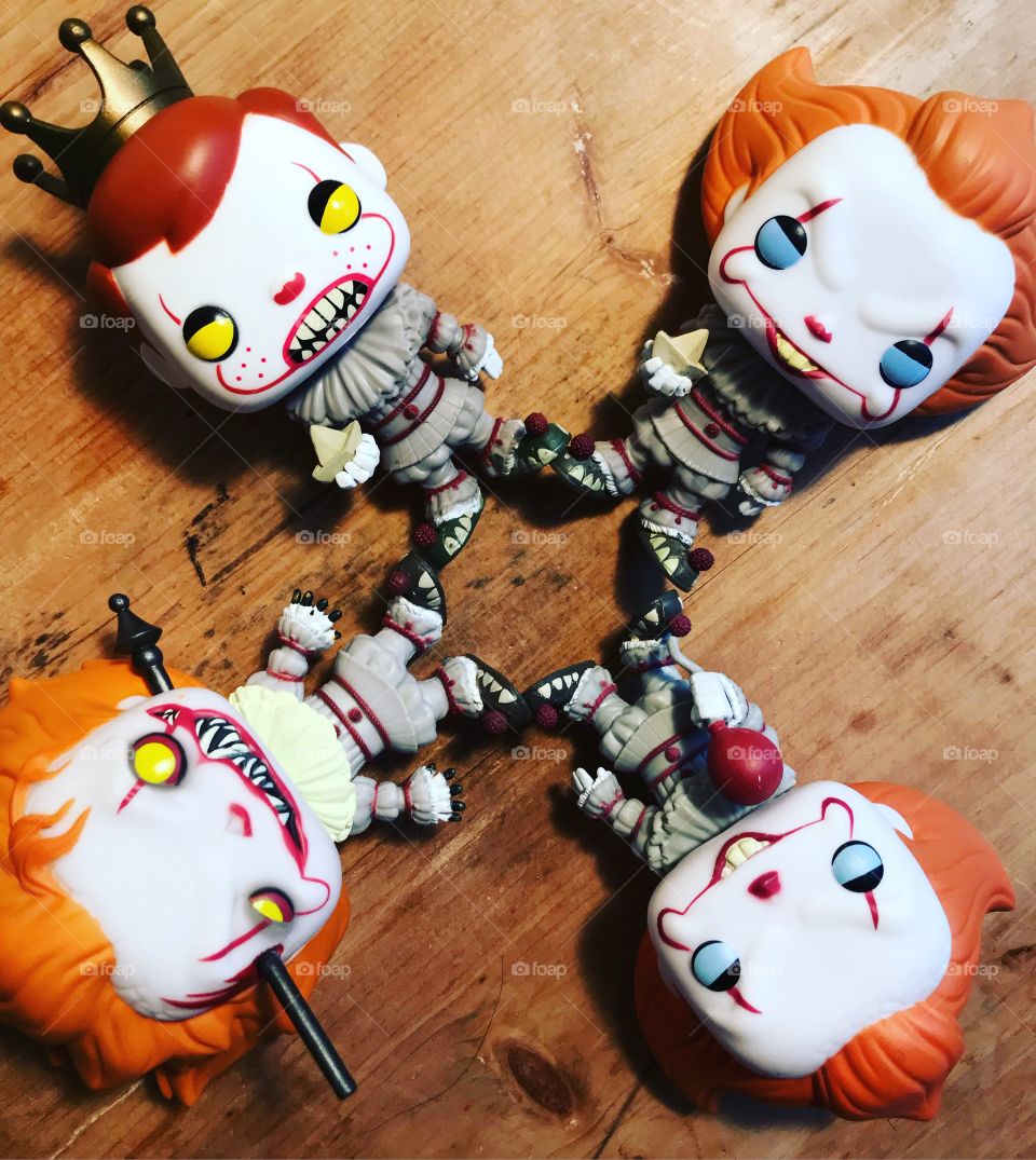 A gang of killer clowns also Known as Pennywise from IT 