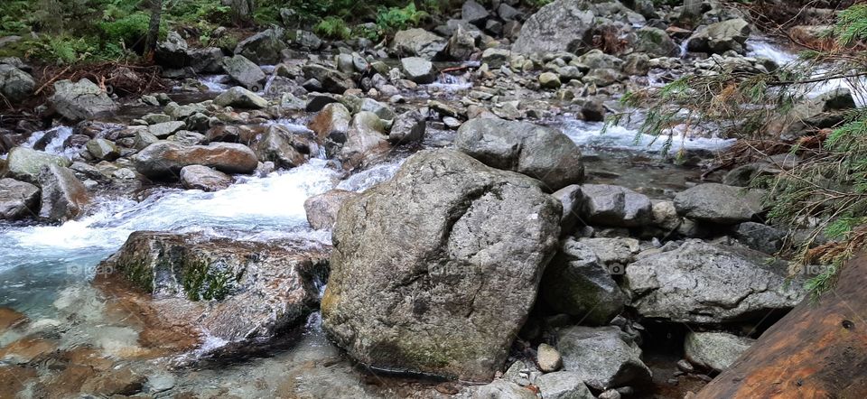 Rock and the stream in the mountains