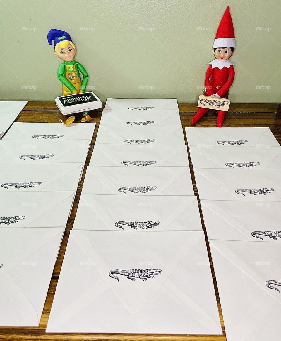 Elf on the shelf helps mail out Christmas Cards, the Christmas Crocodile, mailing out cards, celebrating Christmas, Elf on the Shelf antics 