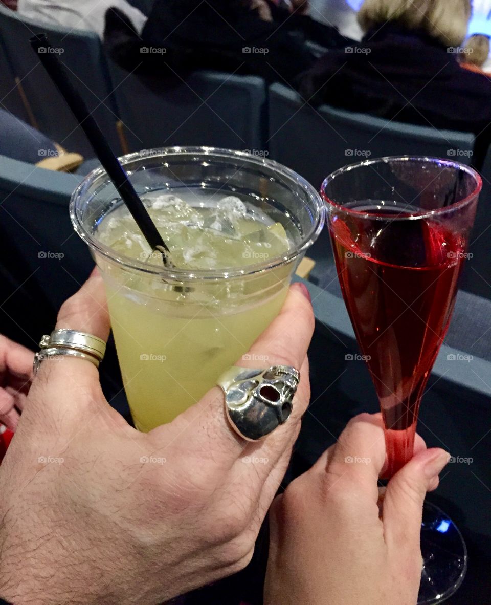 Cheers! Rocker hands holding cocktails! Drinks