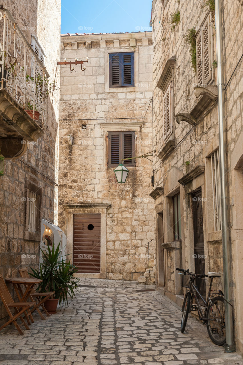 Alley of medieval Hvar downtown. Croatia.