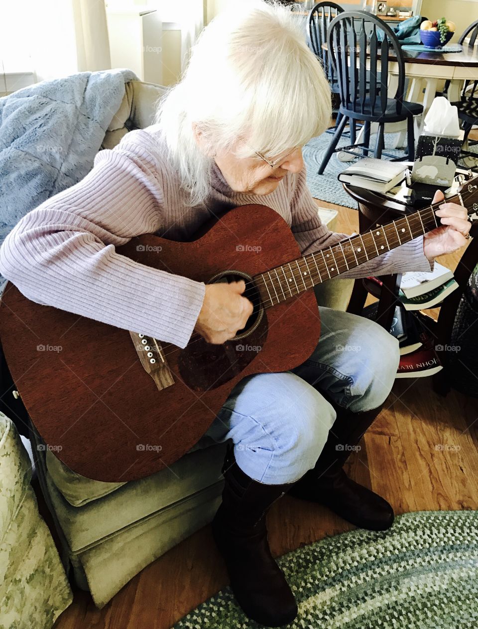 Senior Playing Guitar