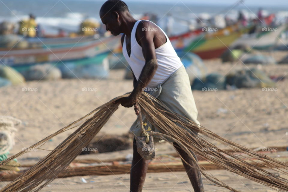 fisherman preparing net for 🎣