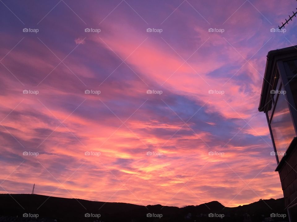 Red sky at night, Ilfracombe town in North Devon is ready for another day of beauty. The variety of colours, patterns and reflection in the window is amazing. 