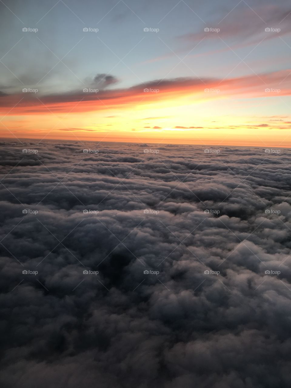 Sunset above the clouds