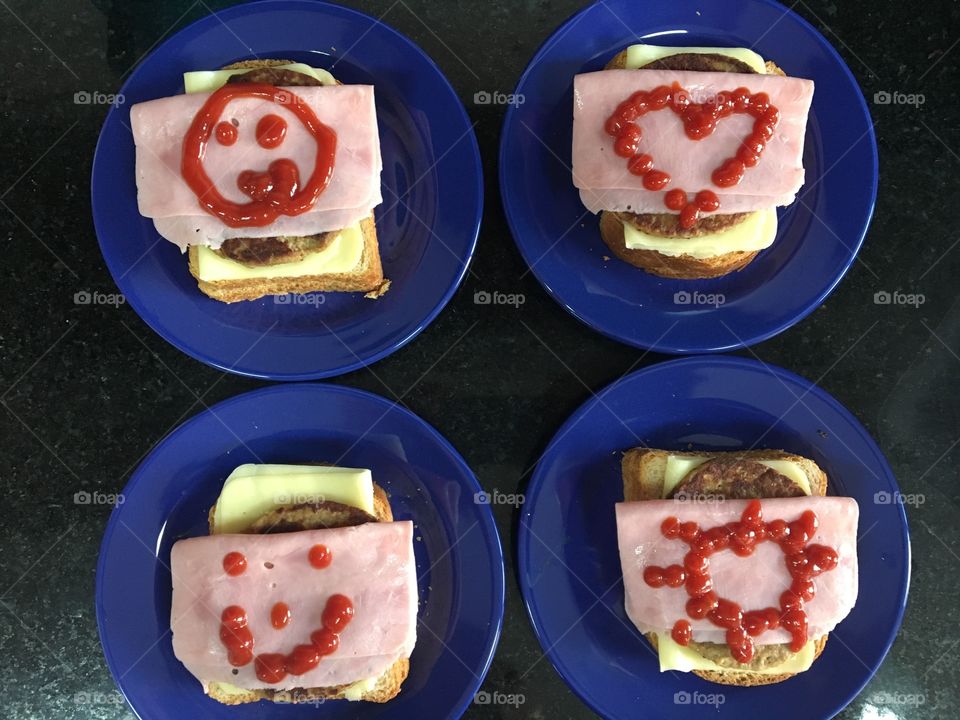 Mom preparing sandwiches for the family