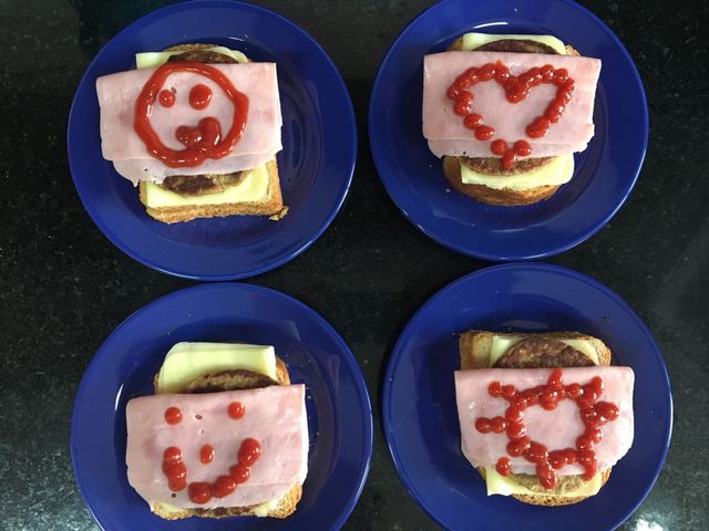Mom preparing sandwiches for the family