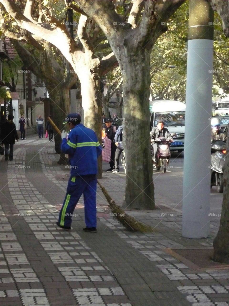 chinese sweeping. sweeping streets of Beijing