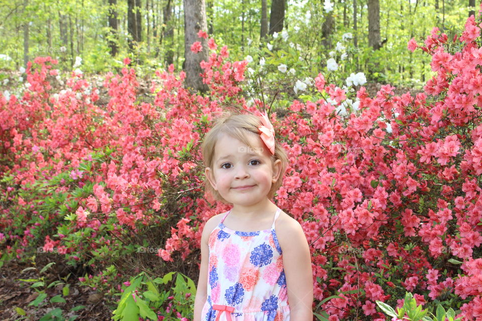 smiling child enjoying spring. Backyard beauty