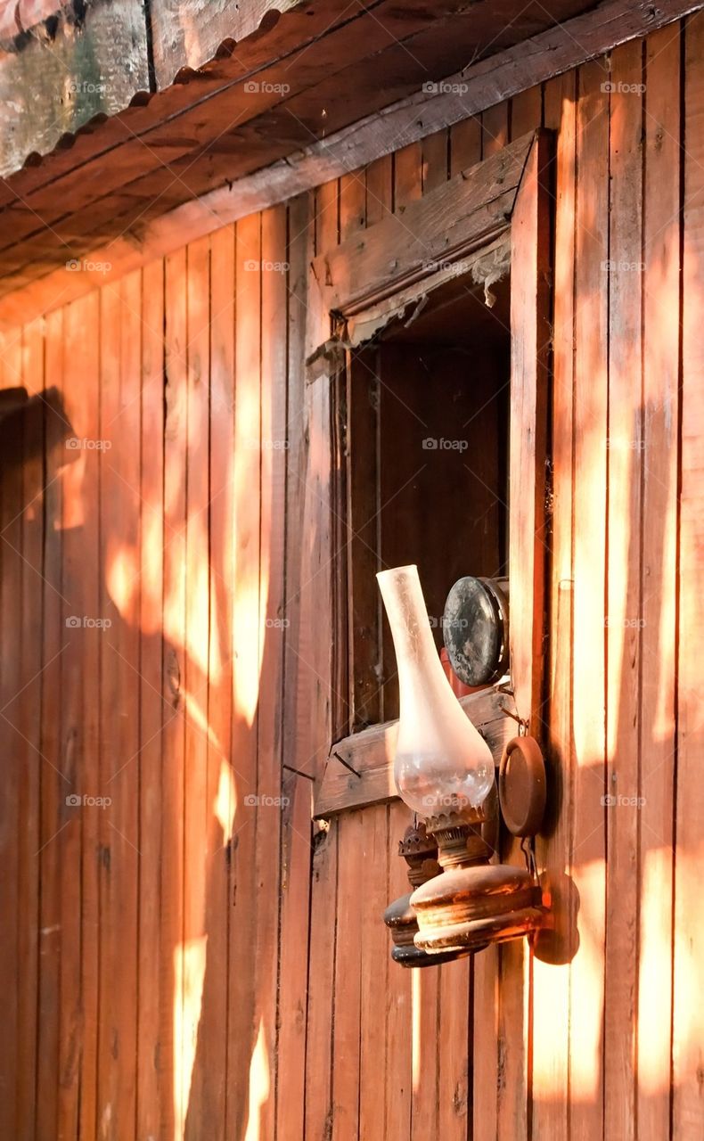 Antique Gas Lamp On Wooden Wall