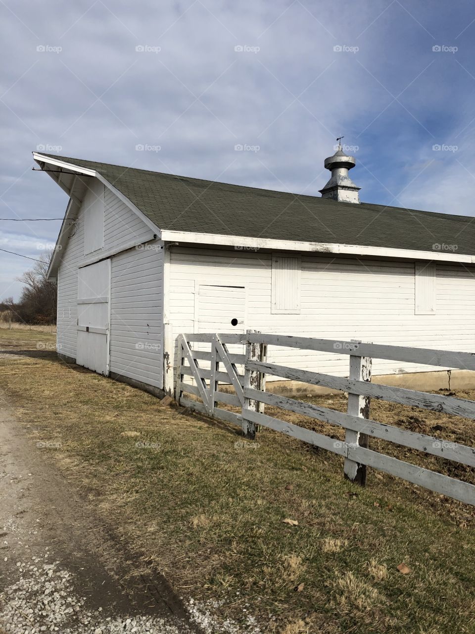 Old white barn in the country.