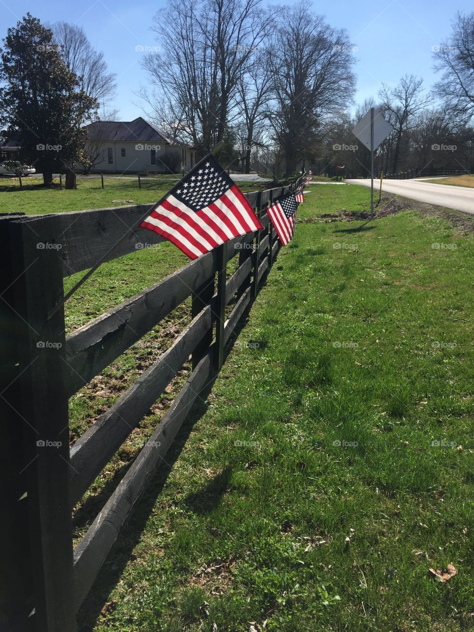 United states flex on a fence in Kentucky