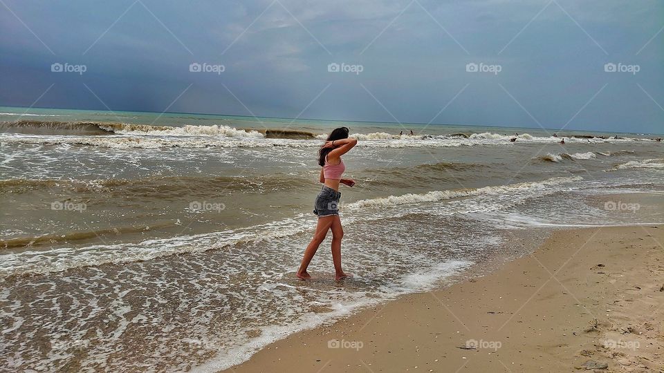 morning walk along the beach and the raging waves of the sea