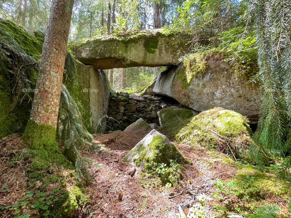 Rock window in the forest.