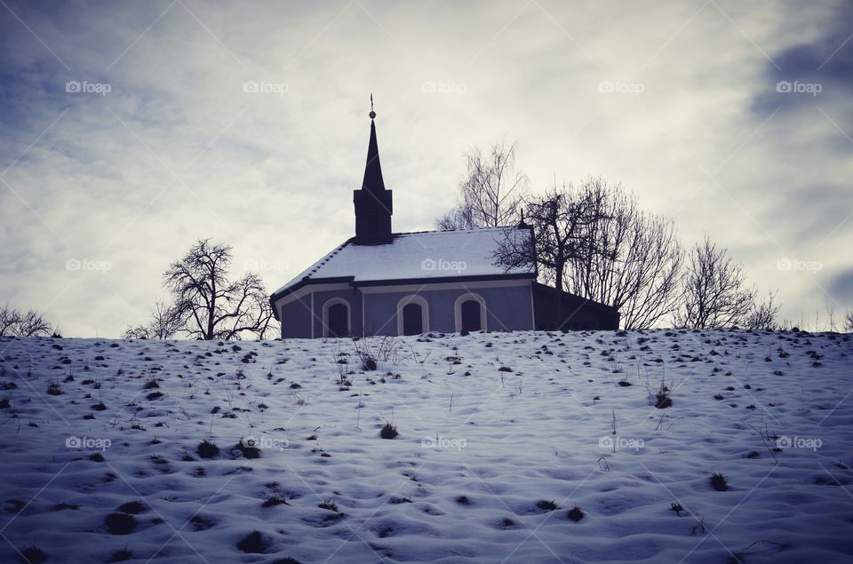 beautiful church on winter background