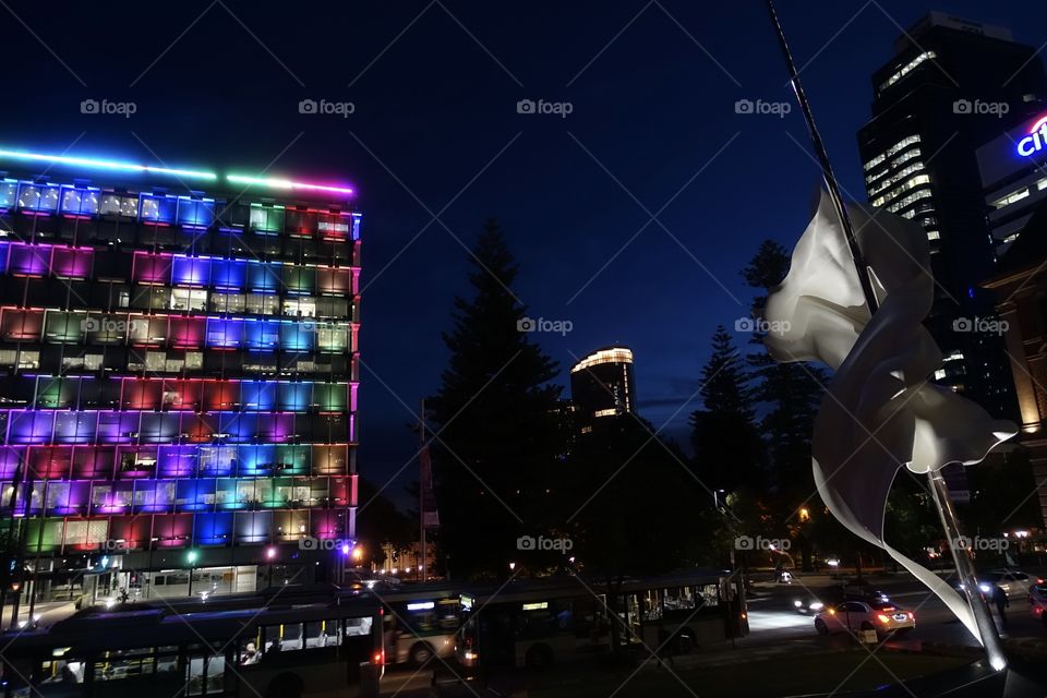 Night view from Cathedral Square, Perth Western Australia. Council house is illuminated by colourful LED. 