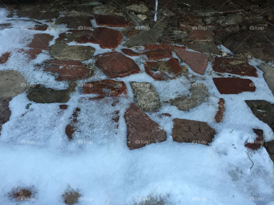 Snow on bricks