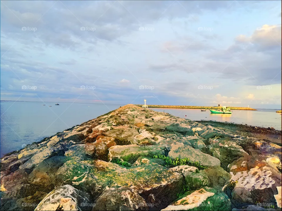Rocky harbour and ship