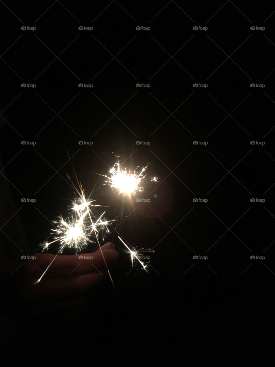 Hand holding Sparkler 