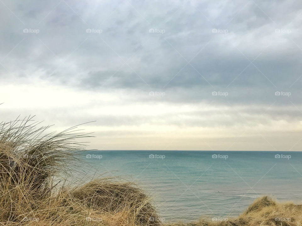 A day at the beach. It was a little windy and cloudy, but we didn’t care, it was a nice trip...
