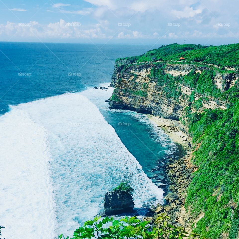 Breathtaking scenery of a cliff paving into the Indian Ocean