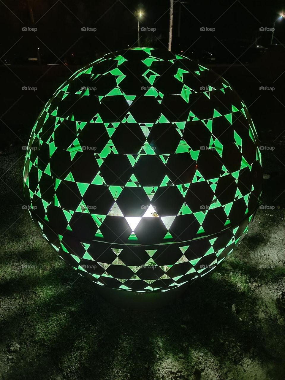 light streaming from the sphere