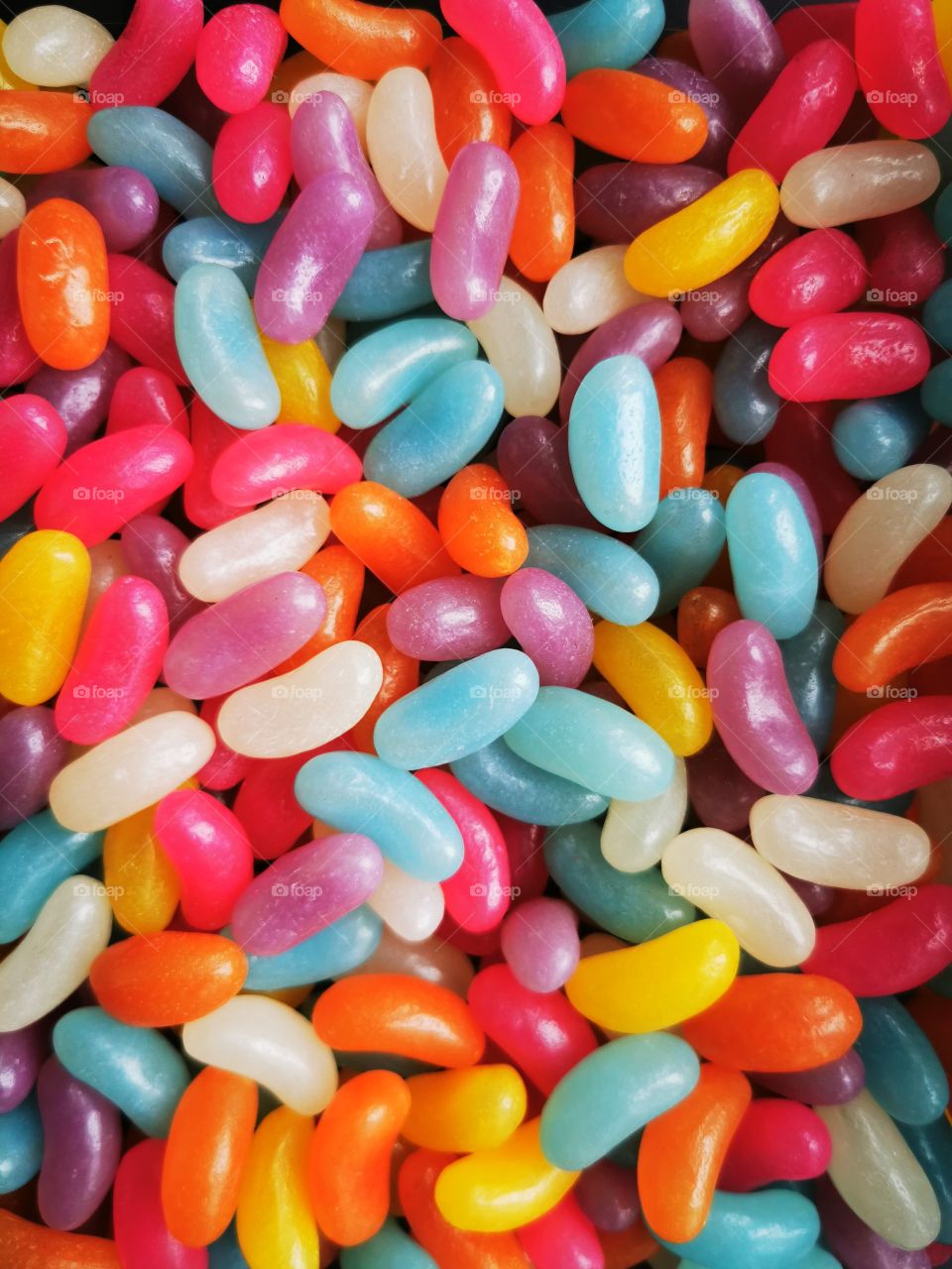 Colourful sugary jelly bean sweets in a pile.